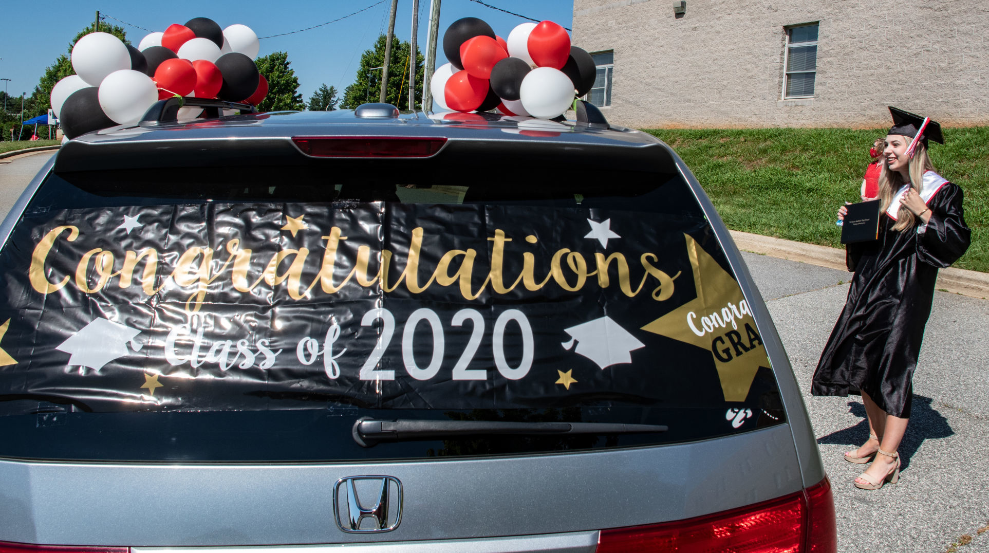 Northwest Guilford High School's drive-thru graduation